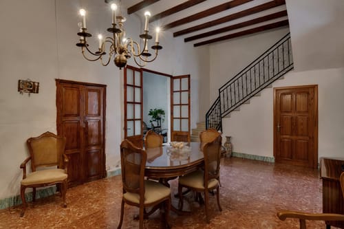 Village house with garage, spacious inner courtyard, and potential to expand the property.