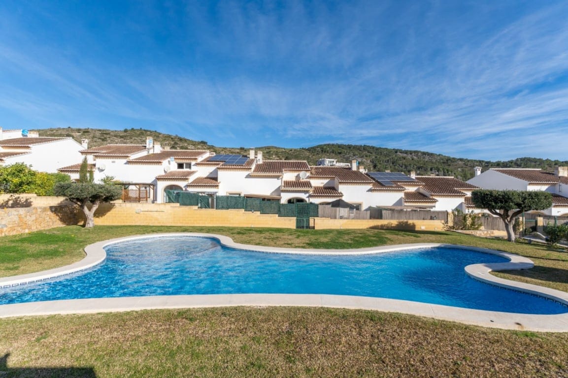 Townhouse with a large south-facing terrace and pool.