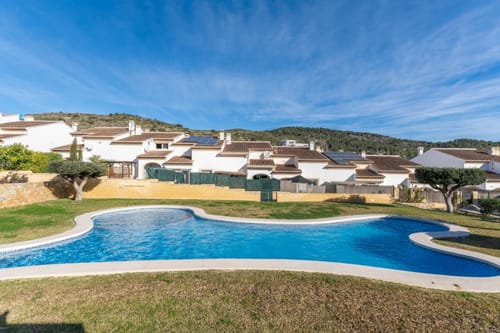 Townhouse with a large south-facing terrace and pool.
